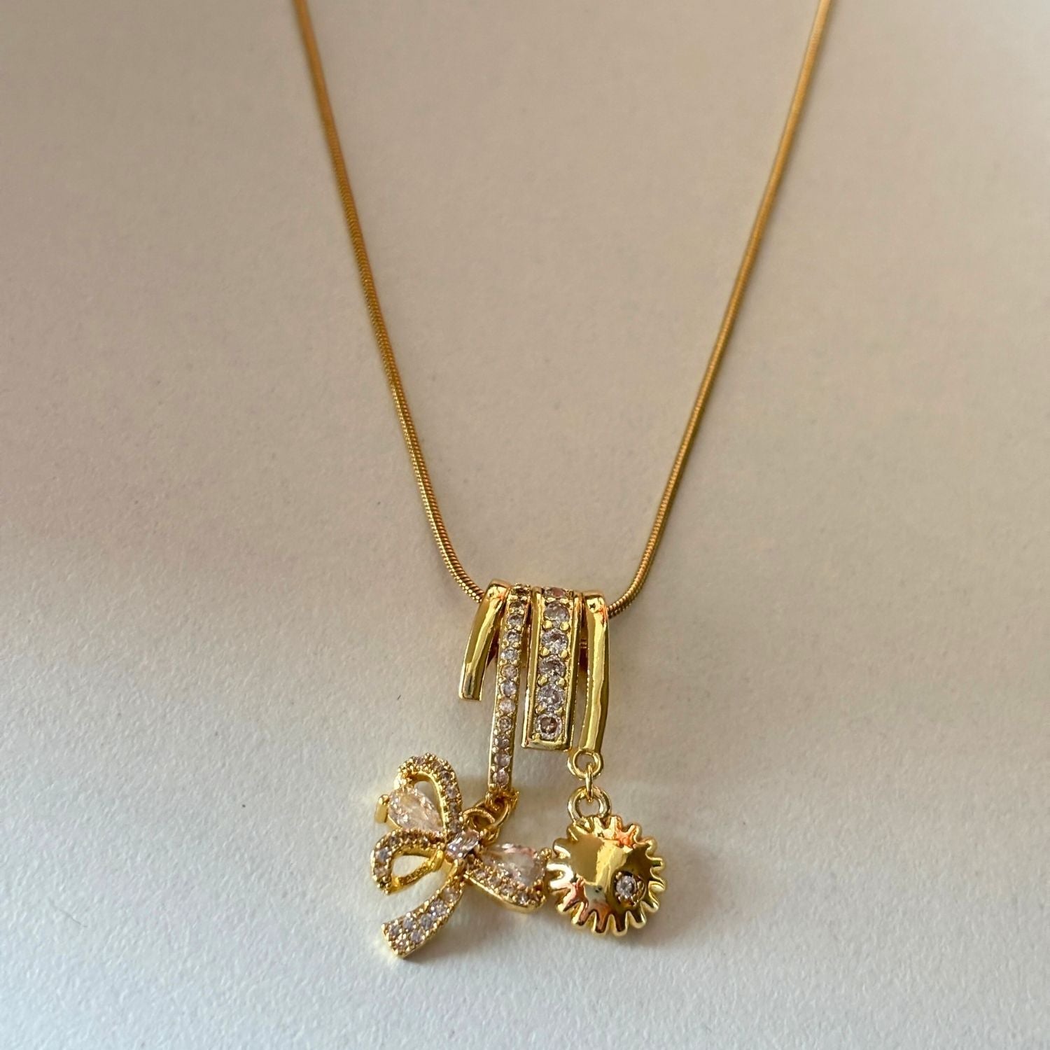 Bow & Sun Charm Necklace